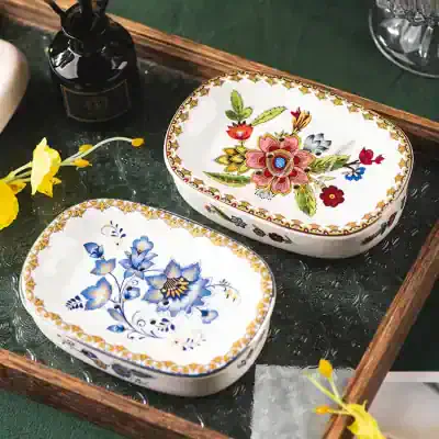 Vivid floral patterned ceramic jewelry boxes with intricate designs, perfect for storage and decorative purposes at Monalisa Medical Store.