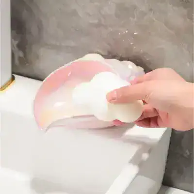 White and pink ceramic cosmetic spatula with a cloud-shaped handle used for skincare and beauty treatments at Monalisa Store.