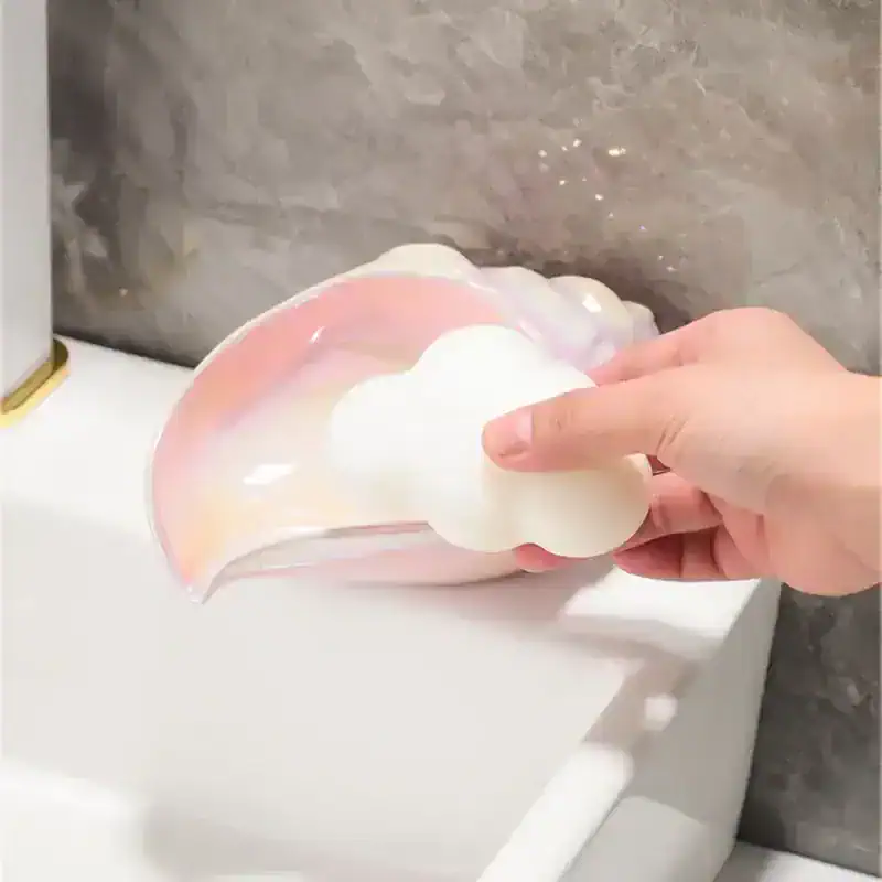 White and pink ceramic cosmetic spatula with a cloud-shaped handle used for skincare and beauty treatments at Monalisa Store.