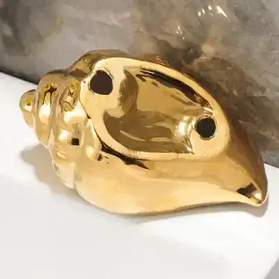 Gold skull decor piece for luxury interior design, modern art sculpture, Monalisa Store upscale home decor, stylish gold ornament, unique gift idea for collectors.