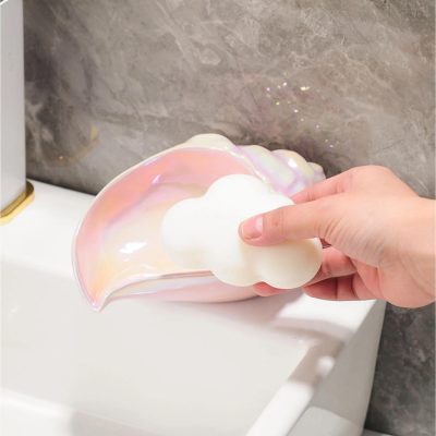 Vibrant iridescent heart-shaped soap with cloud accents, displayed on a white surface against a marble background at Monalisa Store.