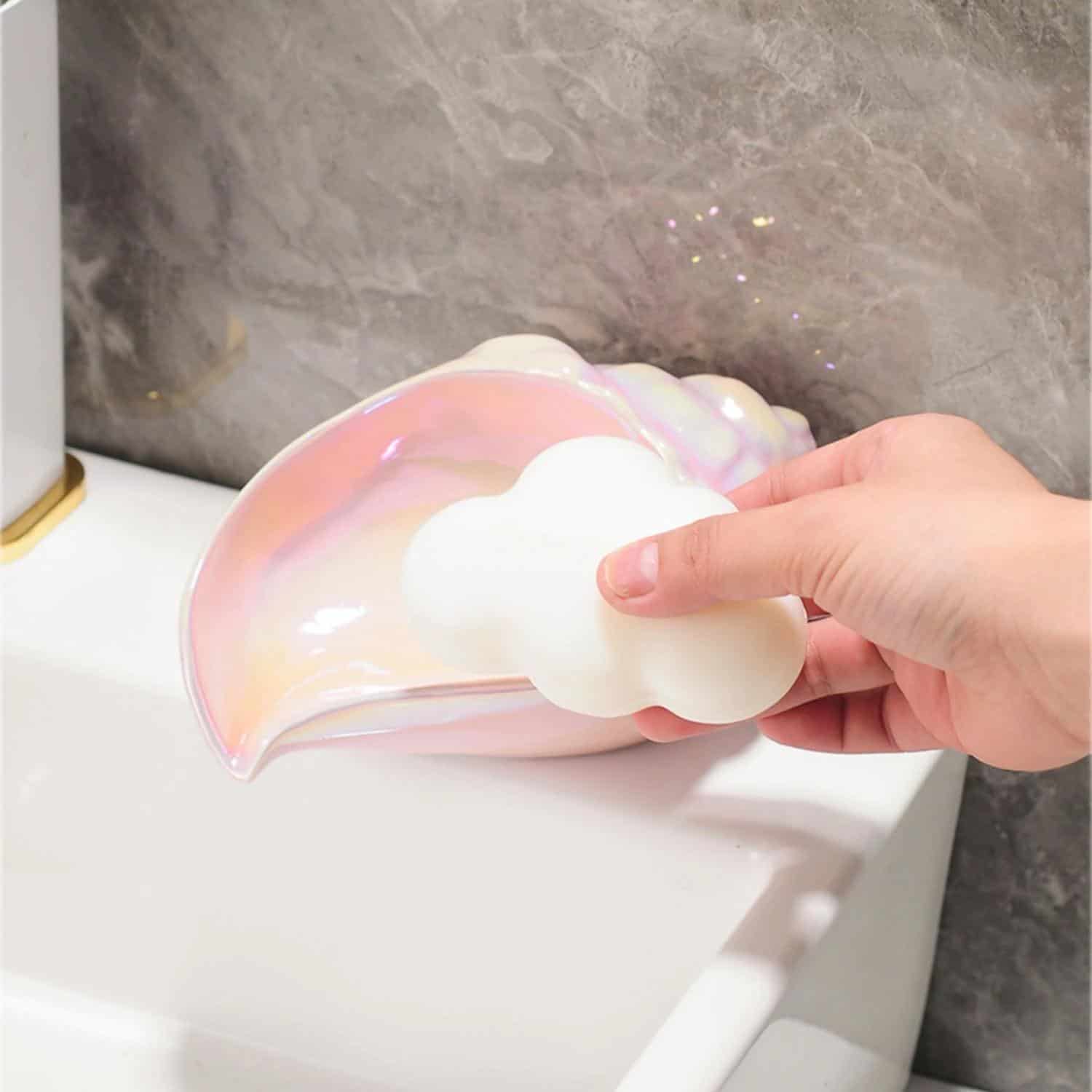 Vibrant iridescent heart-shaped soap with cloud accents, displayed on a white surface against a marble background at Monalisa Store.