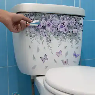 White toilet with purple floral butterfly decal, bathroom decor, delicate flower design, decorative toilet sticker, Monalisa Store.