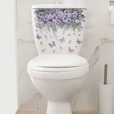 Butterfly floral design on white toilet tank with purple roses and butterflies decor, Monalisa Store bathroom accessories, elegant bathroom decor, floral toilet tank art, modern bathroom design.