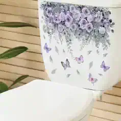Deluxe decorative toilet tank cover with lavender roses and butterflies, enhancing bathroom aesthetics with floral and nature-inspired design. Perfect for bathroom decor improvement.