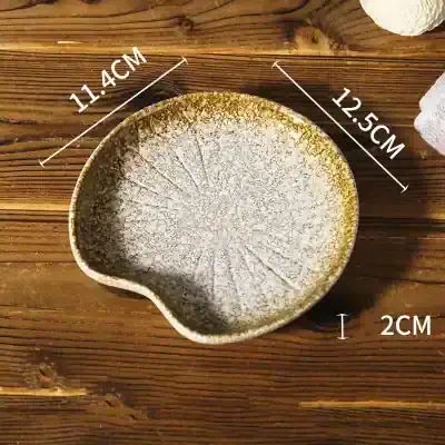 Handcrafted ceramic soap dish with a textured, crackled glaze finish ideal for modern bathroom decor. Perfect for organizing soaps and small accessories.