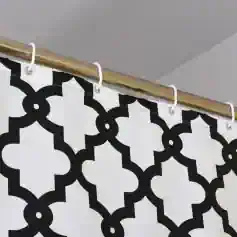 Black and white patterned shower curtain with hooks, modern bathroom decor from Monalisa Medical store.