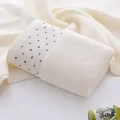 Moisturizing facial towel, white towel with dotted pattern, soft textured facial cloth, facial skincare towel, monalisa store skincare essentials.