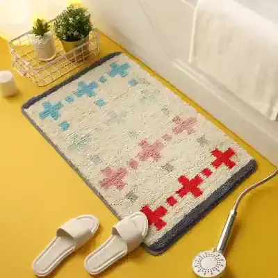 Colorful abstract geometric rug with medical-themed pattern in red, blue, and gray, placed in a modern bathroom setting. Perfect for adding style and comfort to your health or wellness space.