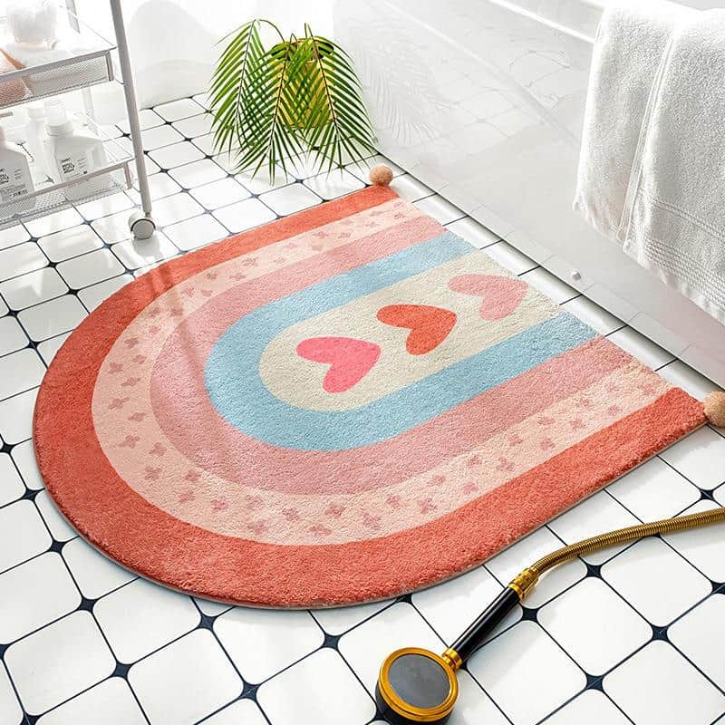 Pink and blue heart-themed bathroom rug with pastel color stripes, perfect for cozy and stylish home decor, ideal for bedrooms and bathrooms at Monalisa Store.