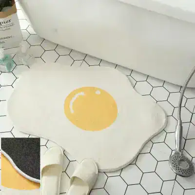 Face bath rug with egg yolk design, plush and soft, ideal for bathroom decor, Monalisa Store Spa bathroom mat, cute and functional for home or spa spaces.