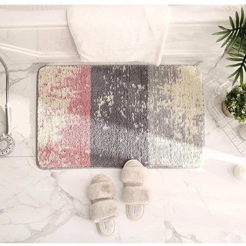Luxury bathroom rug with modern abstract design, soft plush slippers, and elegant marble flooring, perfect for contemporary home decor and comfort.