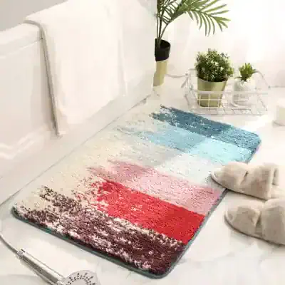 Colorful bathroom rug, plush bath mat with modern multicolor abstract design for home decor and comfort.