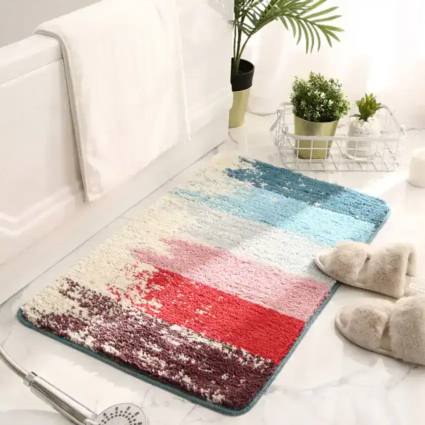 Colorful bathroom rug, plush bath mat with modern multicolor abstract design for home decor and comfort.
