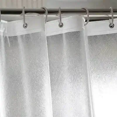 Soft, transparent shower curtain for bathroom decor and privacy, made from water-resistant material, easy to clean and suitable for modern home design.
