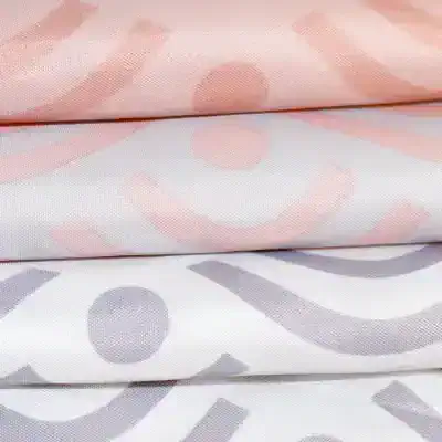 Luxurious Monalisa store branded fabric with subtle pastel pink, white, and gray geometric patterns, perfect for high-end fashion, textile arts, and custom clothing design.