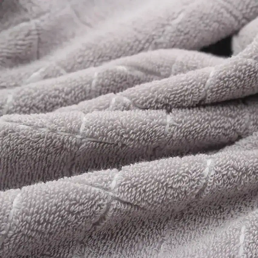 Ultra-soft gray towels, plush and absorbent, perfect for skincare and wellness routines at Monalisa Store. Ideal for spa, gym, and personal use, offering comfort and luxury.