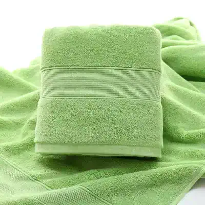 Luxury green towel set for spa and hotel use, soft absorbent towel, plush bath towel, premium quality terry cloth, lightweight and durable for home or professional settings.