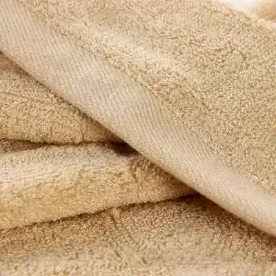 Soft beige terry cloth towels for skincare and spa treatments at Monalisa Store.