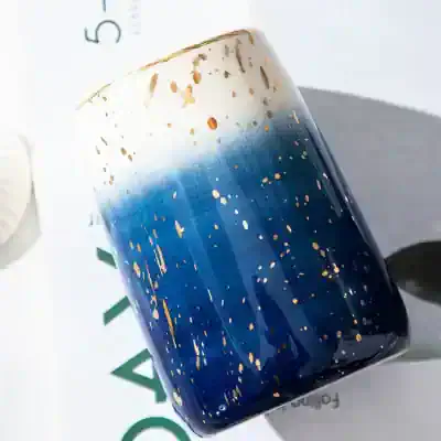 Luxury blue and gold speckled tumbler with a sleek design, perfect for personalized gifts and daily use from Monalisa Store. Ideal for fans of premium drinkware and stylish accessories.