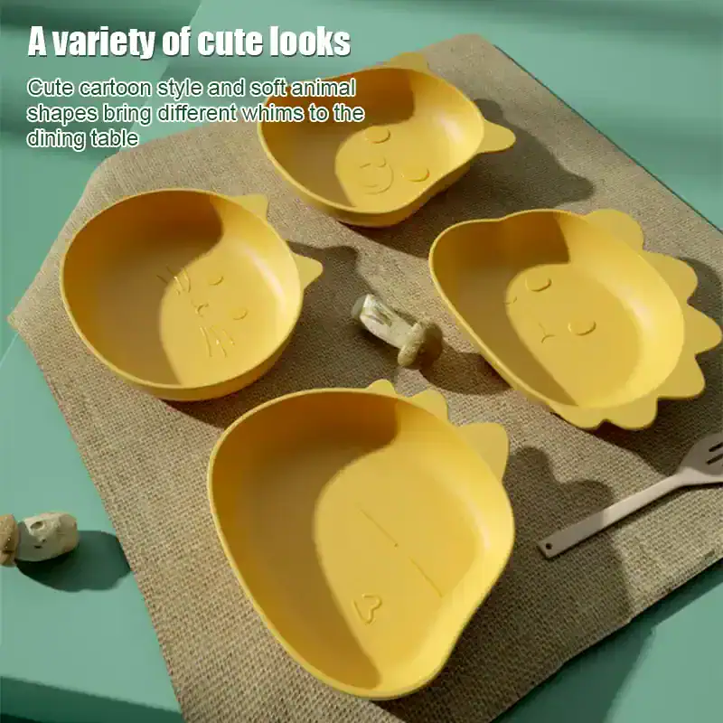 Colorful animal-shaped bowls suitable for kids' dining and serving, perfect for adding fun to meal times. Bright yellow with whimsical facial features, these cute cartoon-style dishes are ideal for family kitchens.