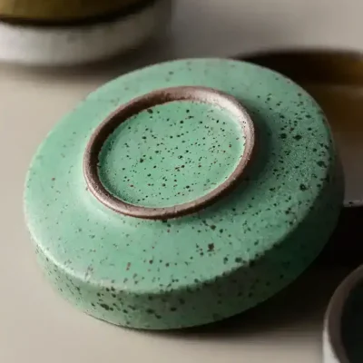 Green foot spa massage stone for relaxation and wellness at Monalisa Store.