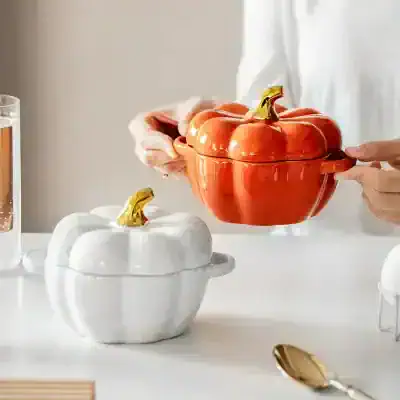 Pumpkin-shaped ceramic bowls for kitchen decor and serving, available at Monalisa Medical store. Perfect for festive table settings and functional storage.