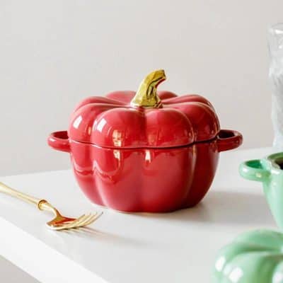 Colorful pumpkin-shaped ceramic container with a gold stem, ideal for kitchen or decorative use at Monalisa Medical Store.