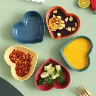 Heart-shaped bowls for sauces and dips at Monalisa Store, colorful and functional for food presentation.