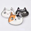 Colorful cat-shaped ceramic dishes with cute facial features, ideal for stylish home decor and practical use. Perfect for cat lovers and adding a playful touch to any space.