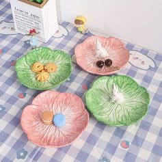 Colorful ceramic leaf-shaped dishware set with cute bunny and cherry decorations, perfect for dessert presentation and decorative purposes at Monalisa Store.