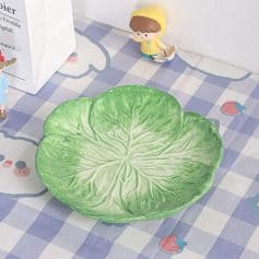 Realistic lettuce leaf ceramic dish for kitchen serving, eco-friendly food presentation, vegetable-themed tableware, fresh look, and durable design.