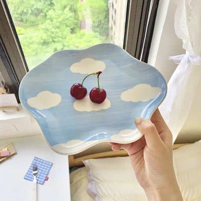 Cherry decorative tray with sky and cloud design, perfect for serving desserts or snacks in a whimsical style. Ideal for adding a fun touch to kitchen or dining decor.