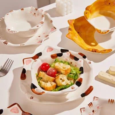 Colorful cat-themed ceramic bowls and plates with unique designs, perfect for serving salads, snacks, or desserts, ideal for pet lovers and cat enthusiasts, available at Monalisa Store.