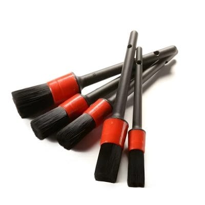 Soft-bristled cleaning brushes with black handles and red ferrules, suitable for dental or medical instrument cleaning at Monalisa Store.