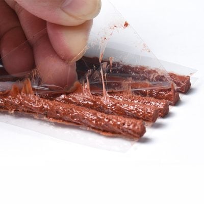 SlimGum dental chew strips with flavored beef for fresh breath and dental health, designed for pets. Easy to break into smaller pieces for effective oral care and periodontal hygiene.