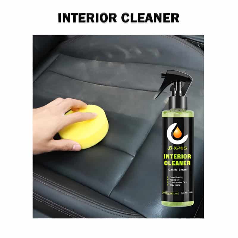 Aerosol interior cleaner spray and yellow sponge cleaning car leather seat, removing dirt and stains, promoting a clean and fresh vehicle interior.