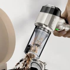 High-tech vacuum cleaner showing powerful suction cleaning dirt and debris from a beige surface, emphasizing modern cleaning solutions.
