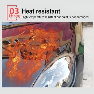 Fire damage to a high-temperature resistant car paint on a black vehicle's hood. The paint remains intact despite intense flames, demonstrating durability and heat resistance for automotive finishes.
