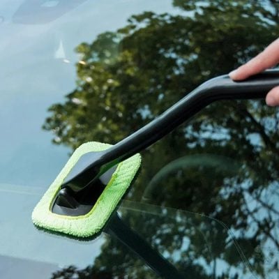 Microfiber cleaning tool used for car glass cleaning at Monalisa Store, specializing in high-quality optical care and maintenance products.
