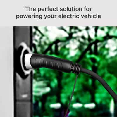 Charge cable plugged into electric vehicle charging port for eco-friendly transportation.