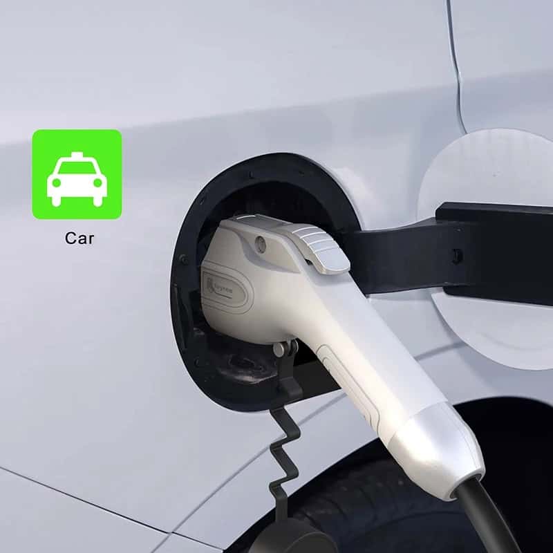 Electric vehicle charging port on modern car with charging cable plugged in, eco-friendly transportation, EV charging station, auto industry, clean energy, Monalisa Medical Store, opt, safe and fast charging, vehicle emission reduction, renewable energy, sustainable mobility, electric car infrastructure.