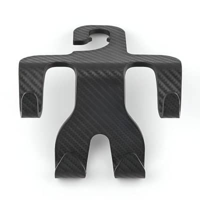 Lightweight carbon fiber phone holder with a modern, ergonomic design for easy access and secure grip, perfect for car dashboards or desks.