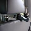 Headrest monitor mounts attached to vehicle seats, designed for in-car entertainment and monitoring systems. Suitable for transport services or commercial vehicles seeking integrated screen solutions.