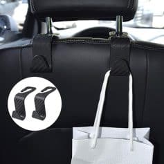 Carbon fiber car headrest hooks for hanging handbags and accessories, featuring durable design and easy installation for car organization and convenience.
