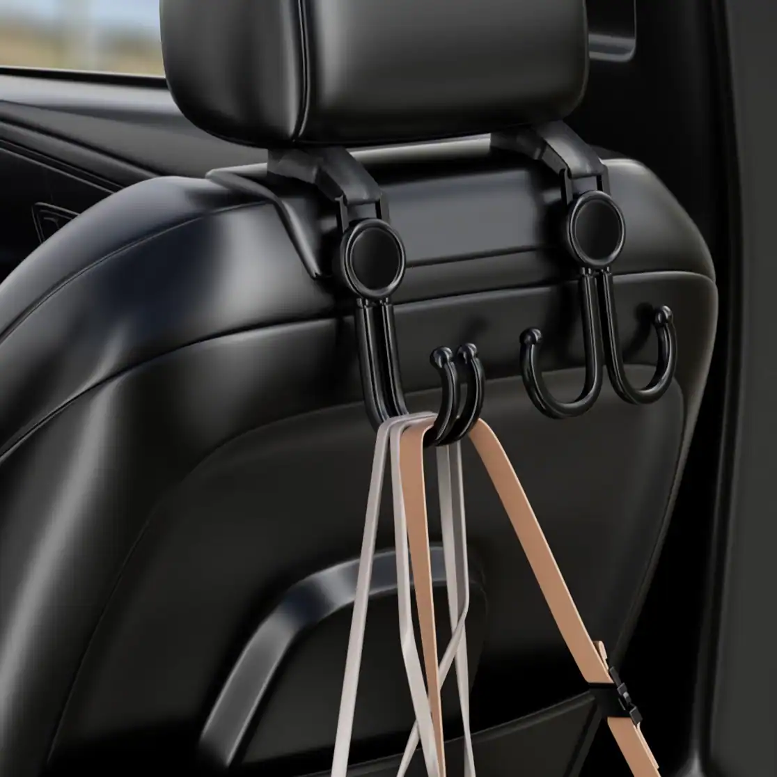 Backseat car organizer hooks with straps on the back of a vehicle seat for convenience and storage, ideal for hanging accessories, bags, or clothing during travel.