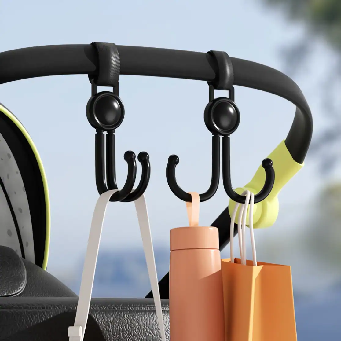 Black and yellow hook rack with shopping bags and water bottle on a car dashboard, outdoor background, organizing everyday essentials while on the go, ideal for travel convenience and car interior accessories.