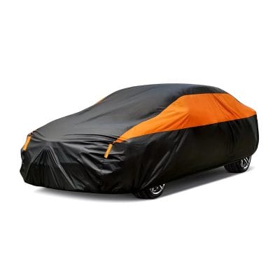 Covered car with protective automotive cover in black and orange, designed for vehicle protection and style.