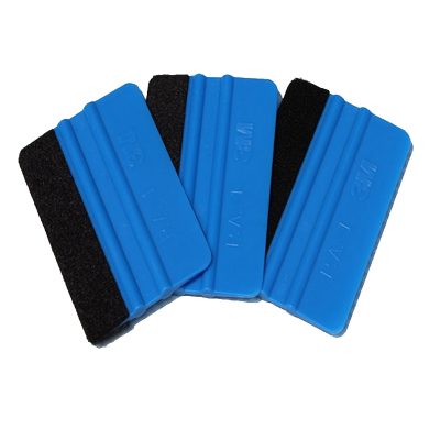 Magnetic lens cleaning cloths for optical device maintenance, featuring blue plush and plastic handle, ideal for eyeglasses, camera lenses, and precision instruments.