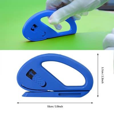 Blue plastic staple remover with ergonomic handle, compact design for office use.